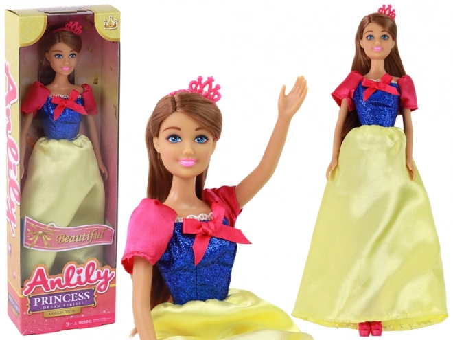 Dukke Anlily Prinsesse med langt mørkt hår og gule kjole