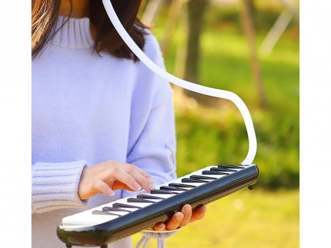 Melodika med klaviatur og etui