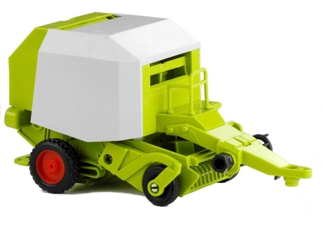 Traktor med ballepresser