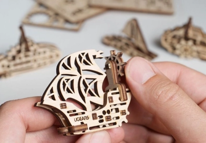 Ugears 3D træ mekanisk puslespil - fire mekaniske vedhæng