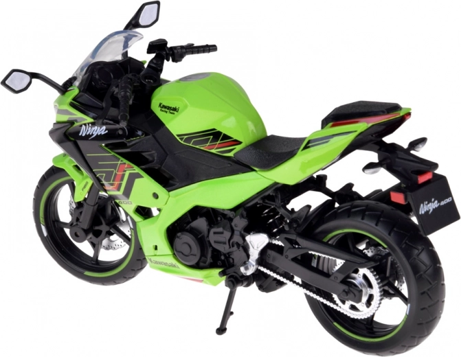 Nedklappelig sidestøttefod til stabil udstilling