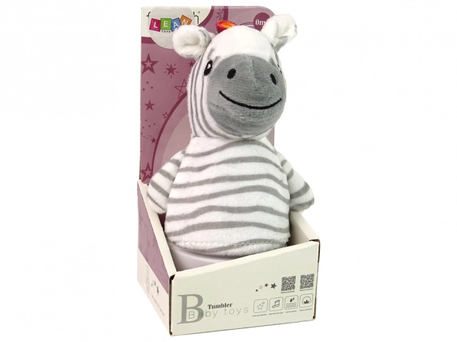 Børnegyngende zebra med lampe og melodi