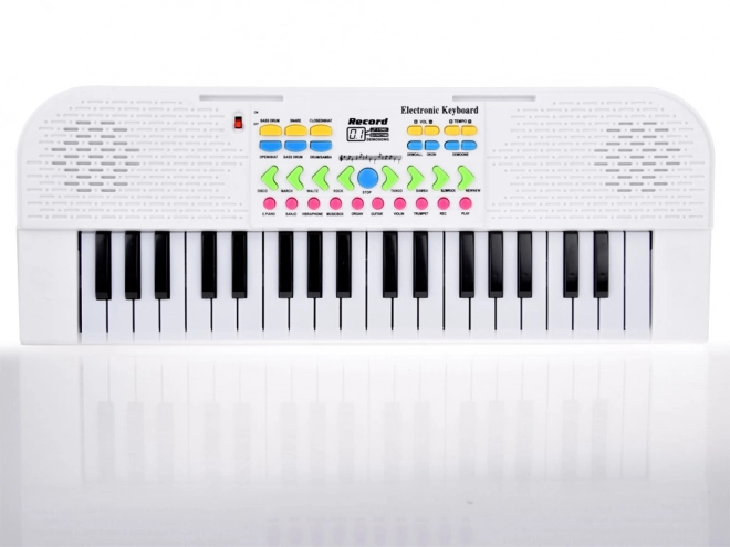 Elektronisk børnekeyboard med mikrofon