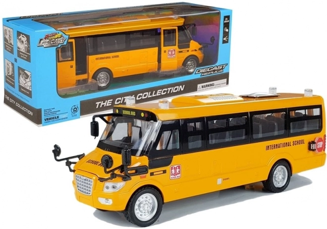 Metal skolebus med træk op motor