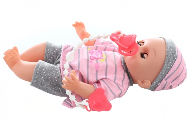 Babydukke tisser 28 cm med lyde og tilbehør