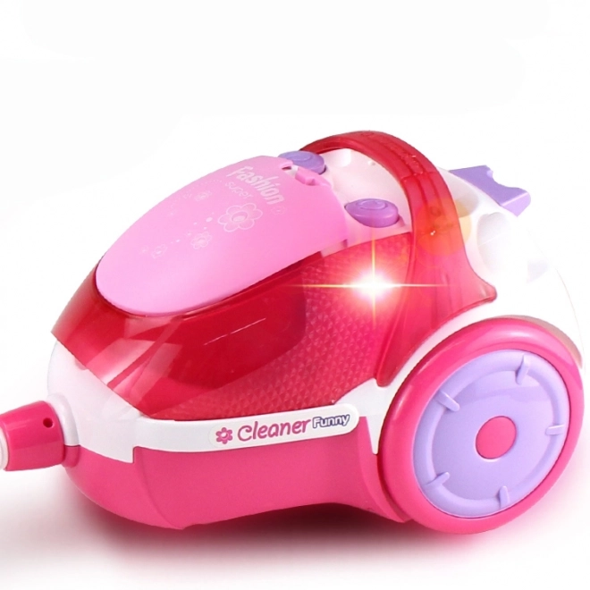 Børnestøvsuger i pink med sugefunktion