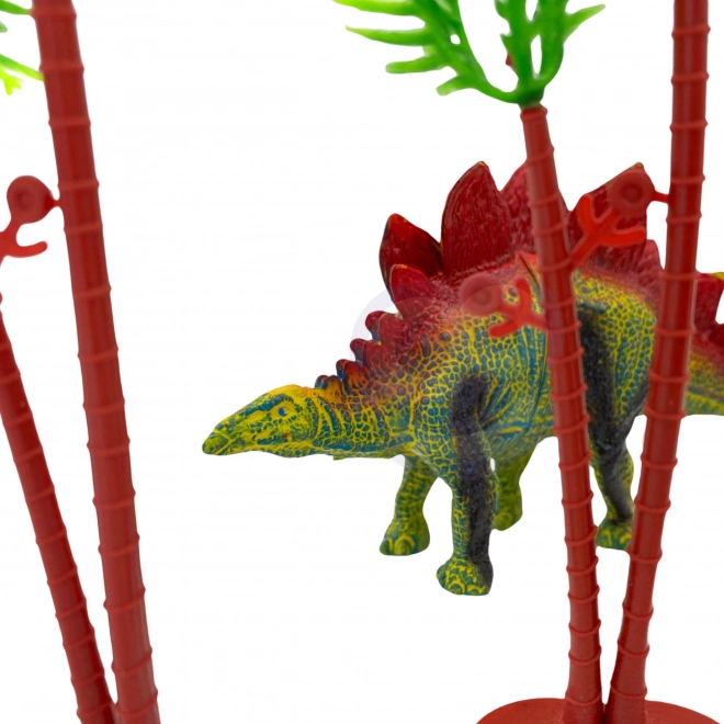 Sæt af dinosaurfigurer med spilleunderlag og kuffert