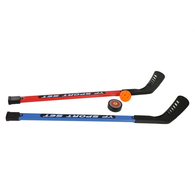 Hockeystænger med bold og puck