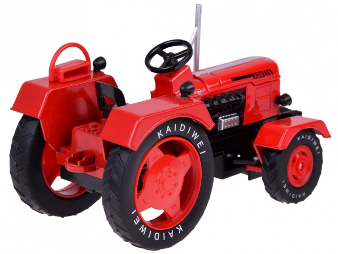 Rød metaltraktor med gummihjul 1:18