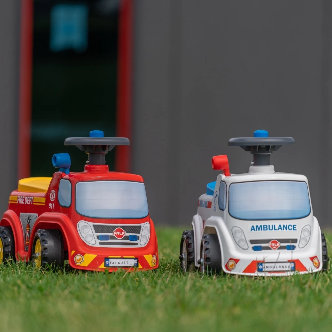 FALK Løbecykel Ambulance med åbent sæde og horn på rattet