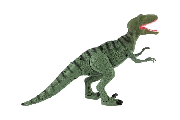Dinosaurus gående IC velociraptor plast 50cm på batteri med lyd og lys i kasse 53x32,5x12cm