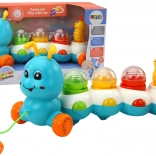 Farverig trækkende larve med lys og lyde