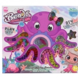 Plastperler i æske med blækspruttemotiv