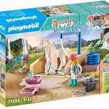 Playmobil Horses of Waterfall: Isabella og hoppen Lioness med hestevask