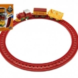 Trækfuldt tog med to vogne og skinner