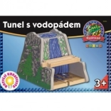 Maxim-tunnel med vandfald