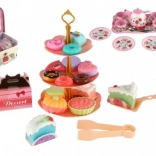 Børnesæt i blik med te i kuffert